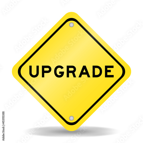 Yellow color transportation sign with word upgrade on white background