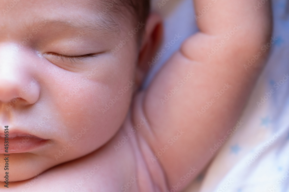 Cute newborn sleeping on bed Cute newborn sleeping on bed