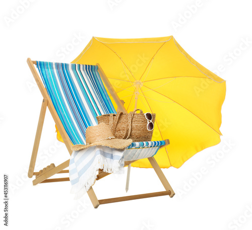Fotografering Open yellow beach umbrella, deck chair and accessories on white background