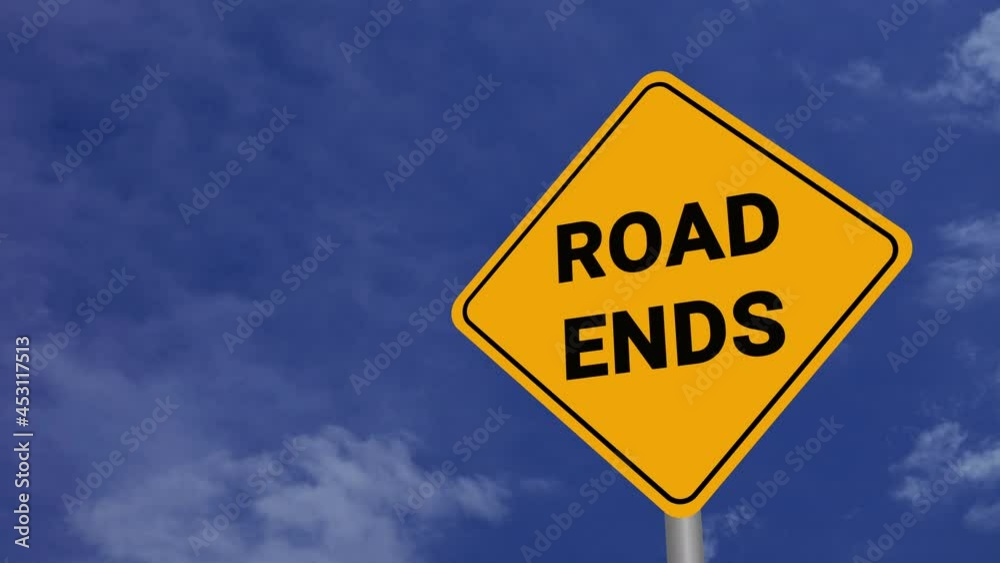 Roads End Road Sign on Clear Blue Sky with Rapid Moving Clouds for Text Placement Roads End Road Sign on Clear Blue Sky with Rapid Moving Clouds for Text Placement