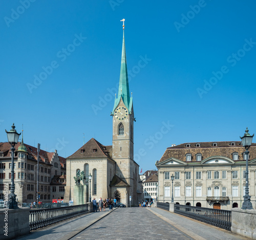 Zurich, Switzerland - August 20th 2021: View of Frauenmuenster church from the bridge over the Limmat river
