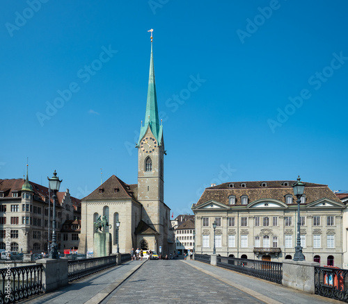 Zurich, Switzerland - August 20th 2021: View of Frauenmuenster church from the bridge over the Limmat river