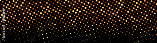 Abstract golden halftone dotted background..