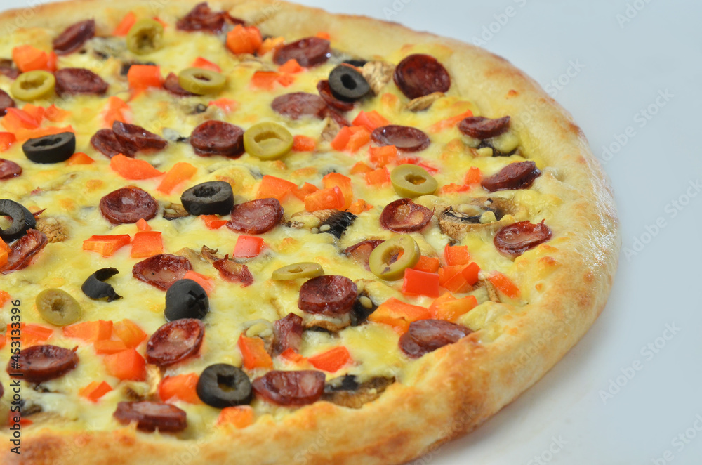 pizza with Cornish mushrooms, cheese and salami top view pizza with Cornish mushrooms, cheese and salami top view