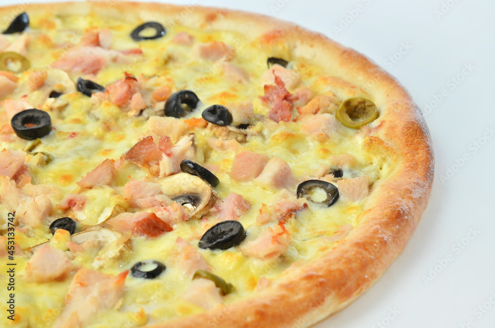 pizza with chicken olives mushrooms and cheese closeup view pizza with chicken olives mushrooms and cheese closeup view