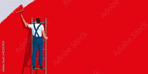 Arrière plan de couleur pour une présentation avec un homme qui peint un mur pour créer un fond rouge.
