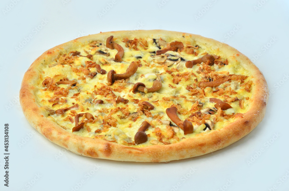 pizza with Cornish mushrooms, cheese and salami closeup view