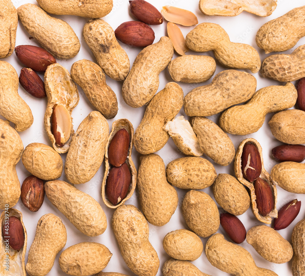 bunch of ecological peanuts on a white background bunch of ecological peanuts on a white background