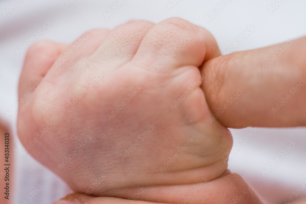 New born white baby hands and fingers New born white baby hands and fingers