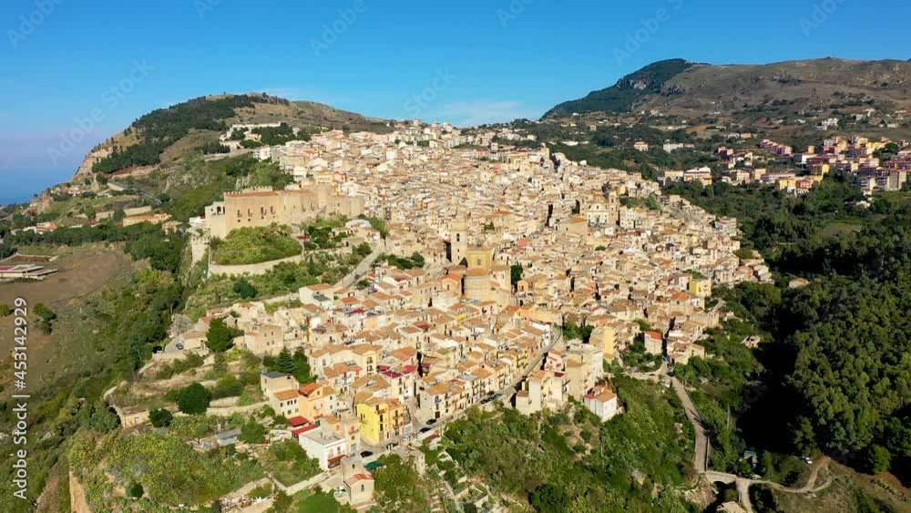 Caccamo, Sicily. Medieval Italian city with the Norman Castle in Sicily mountains, Italy. View of Caccamo town on the hill with mountains in the background, Sicily, Italy. Caccamo, Sicily. Medieval Italian city with the Norman Castle in Sicily mountains, Italy. View of Caccamo town on the hill with mountains in the background, Sicily, Italy.