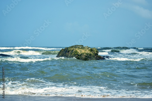 Ocean-Sea Waves, Mountains Rock Stones and Sky Blue Landscape Background