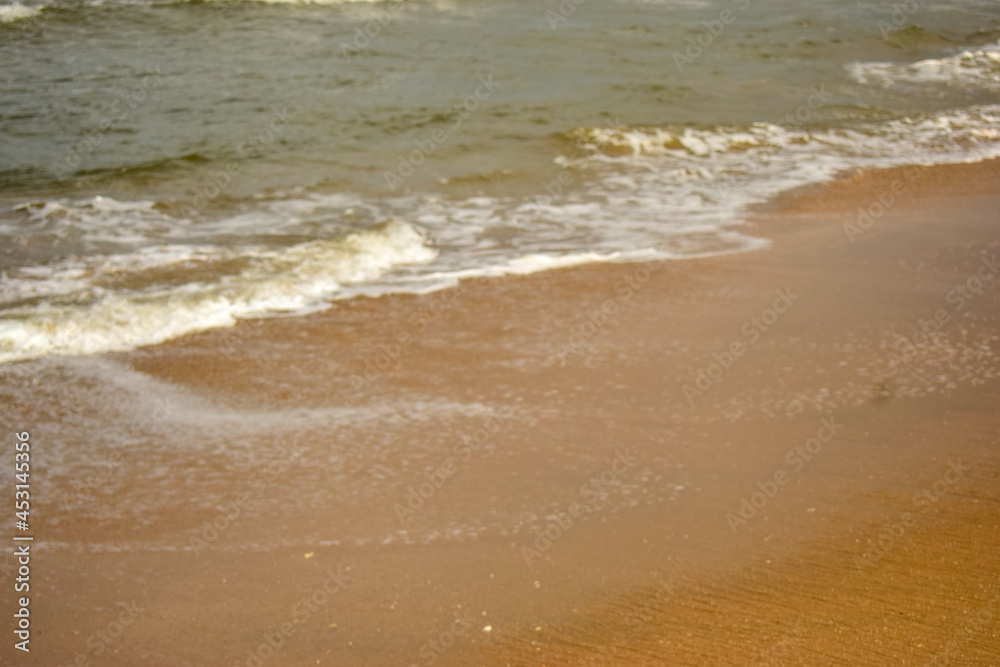 Ocean-Sea Waves Beach Sand and Mountains Yellow Landscape Background