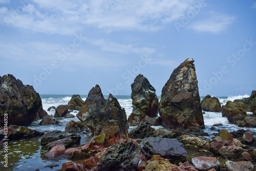Ocean-Sea Waves, Mountains Rock Stones and Sky Blue Landscape Background