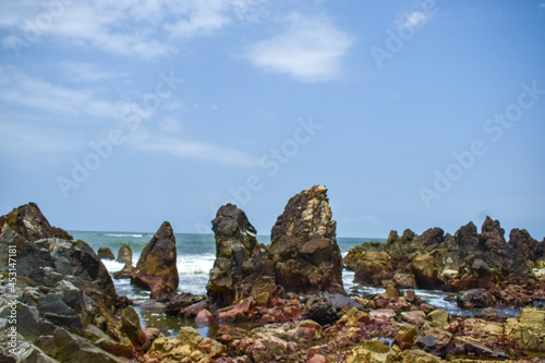 Ocean-Sea Waves, Mountains Rock Stones and Sky Blue Landscape Background