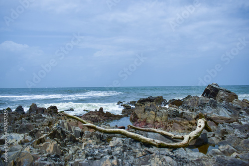 Ocean-Sea Waves, Mountains Rock Stones and Sky Blue Landscape Background
