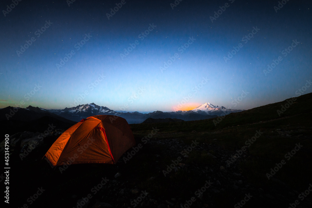 Tent camping in the mountains of Washington State on during a backpacking trip. 