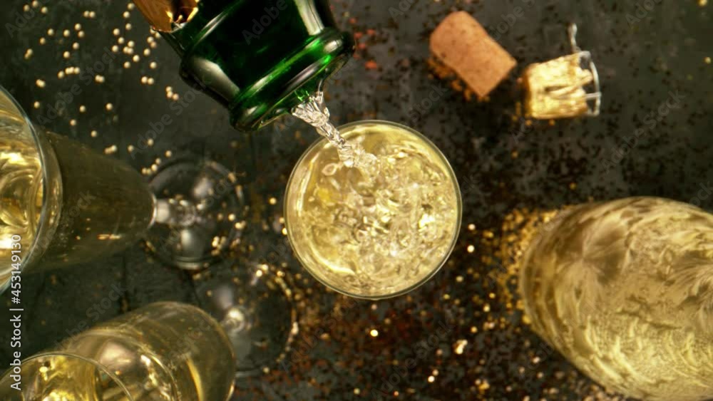 Super slow motion of camera movement into glass of champagne. Unique angle with underwater macro lens. Concept of celebration and success. Filmed on high speed cinema camera, 1000 fps Super slow motion of camera movement into glass of champagne. Unique angle with underwater macro lens. Concept of celebration and success. Filmed on high speed cinema camera, 1000 fps