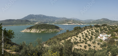 Iznajar lake surrounded by olive groves and pine woods, Cordoba province, Andalusia, Spain