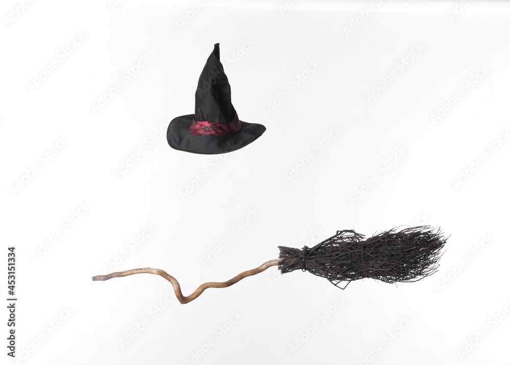 black broom and witch hat isolated on white background Stock Photo