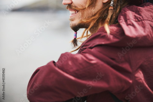 Focused photo on man demonstrating his smile