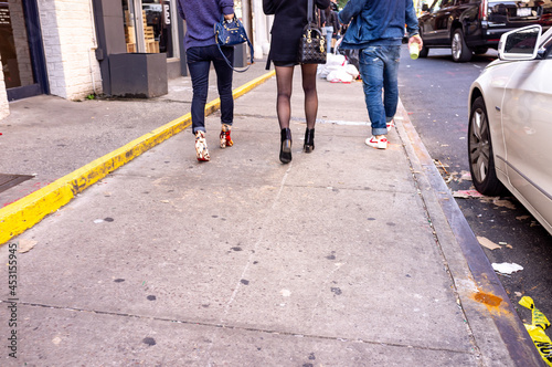 New Yorkers walking in Little Italy, New York City photo