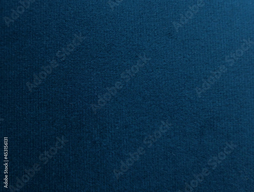 Full frame texture dark blue velvet showing fabric detail with copy space