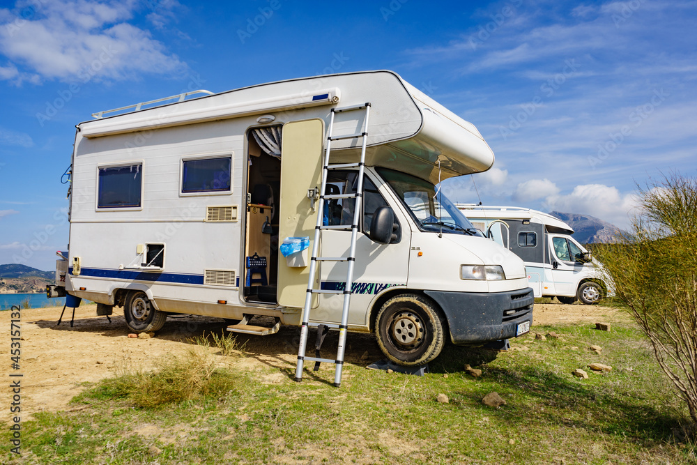 Caravan with ladder. Camper equipment.