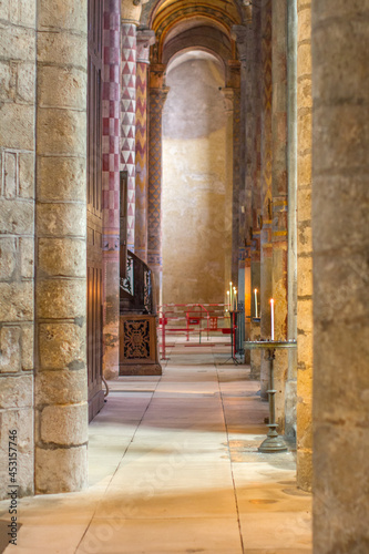 beautiful candle light and religious ambiance in Roman stone church