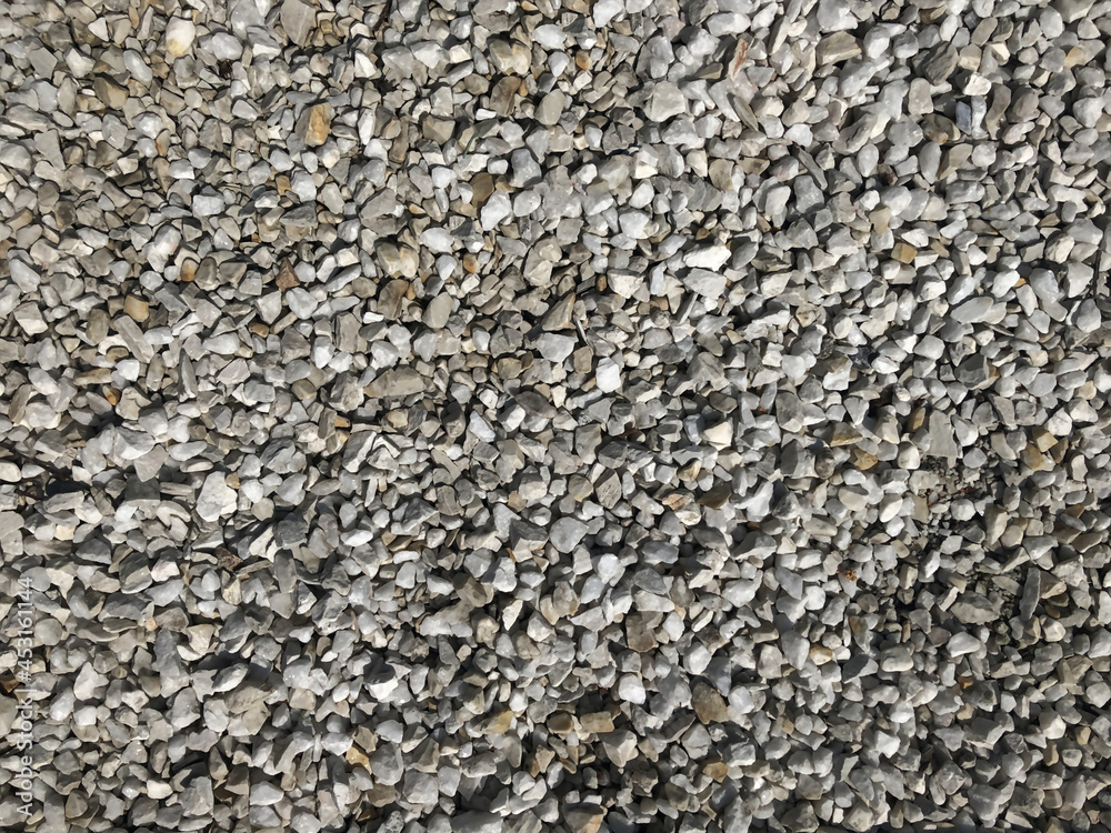 Textured granite surface. Background Pattern, Asphalt Road Texture. Small stones, minerals, thrash, gravel, and chalk are used to hold trees and decorate the interior and exterior design. Perfect for