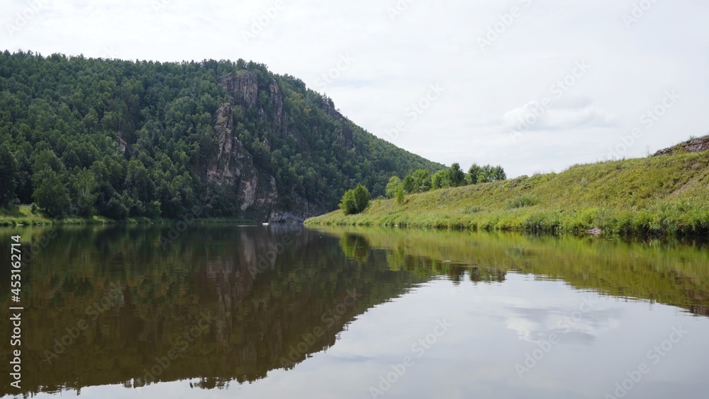 South Ural mountains with a river. The nature of the South Urals in Russia. South Ural mountains with a river. The nature of the South Urals in Russia.