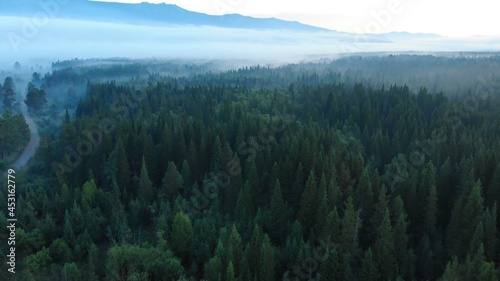 Forests and mountains of the Southern Urals near the village of Tyulyuk in Russia. Drone view. © Довидович Михаил