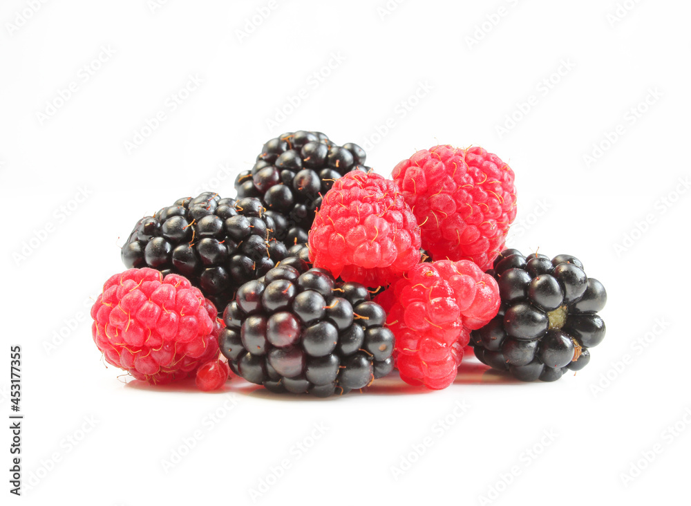 Mix of blackberries and raspberries isolated on white background. Raw fruit Mix of blackberries and raspberries isolated on white background. Raw fruit