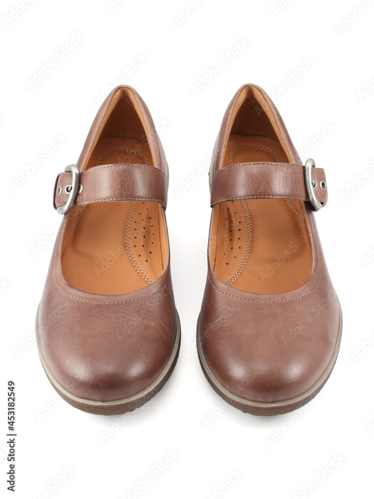 Casual brown leather lady shoes on white