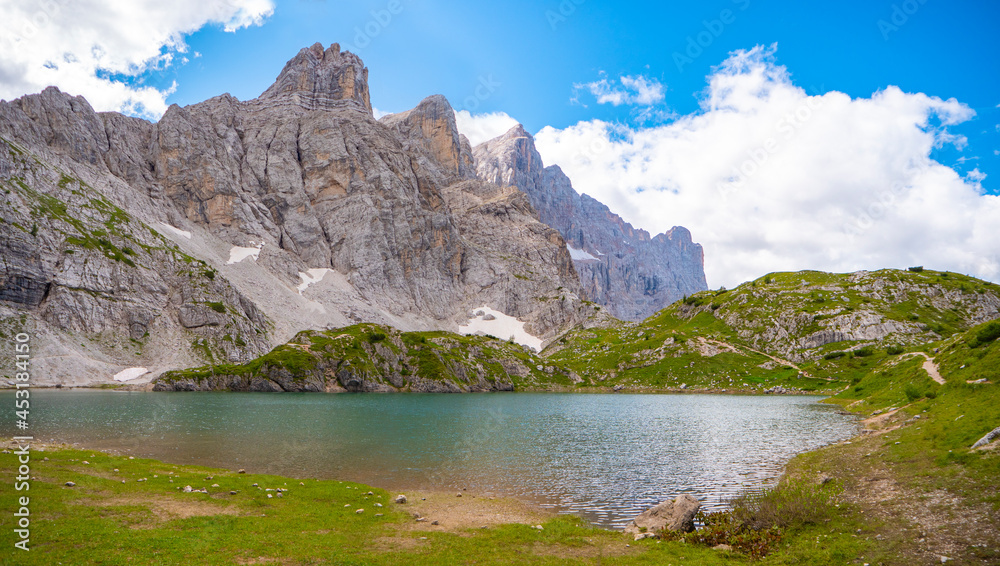 Mountain lake with pure high altitude water, unspoiled nature of the dolomites, Lago di Coldai, province of Belluno, Italy