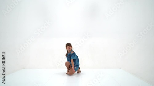 Little girl with teddy bear.On white background.