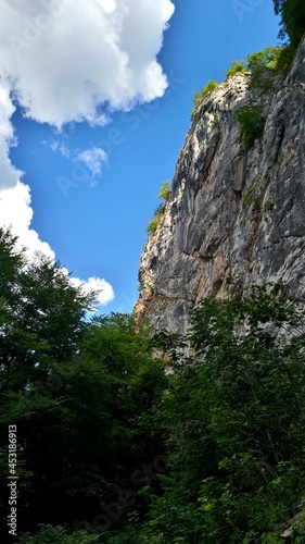 Big cliff near waterfall Skakavac, mountain Ozren, Bosnia and Herzegovina