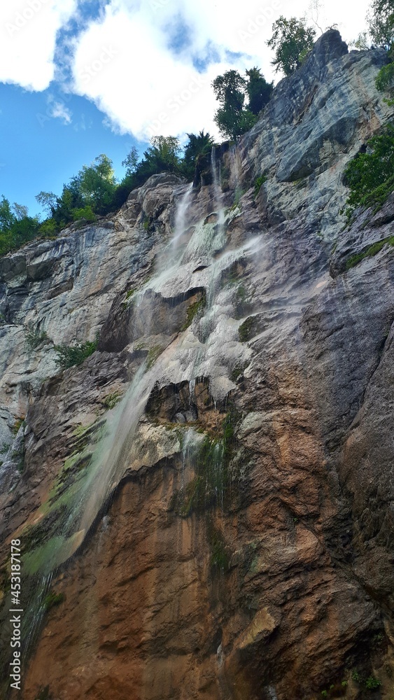 Waterfall Skakavac and green rocks behind it, Sarajevo, Bosnia and Herzegovina