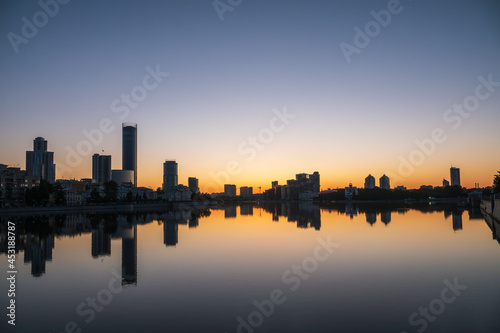 Sunset on a pond in the center of the city. Yekaterinburg  Russia