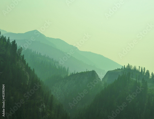 British Columbia Canada many fires create misty mountain landscape