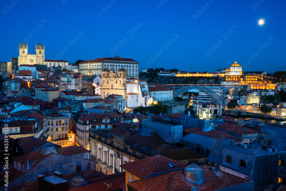 Fototapeta premium Famous view of Porto by night with moon,