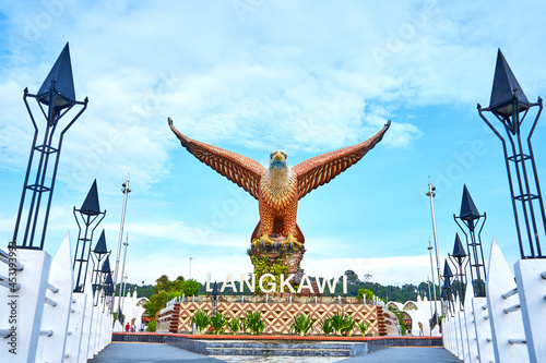 A sculpture of a red eagle spreading its wings. Popular tourist spot on Langkawi island photo