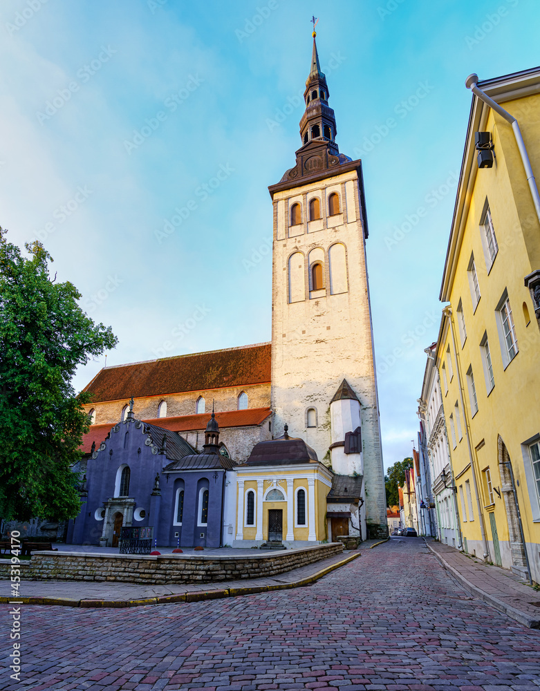 Obraz premium Medieval St. Olaf Church with its high tower in the city of Tallinn Estonia.