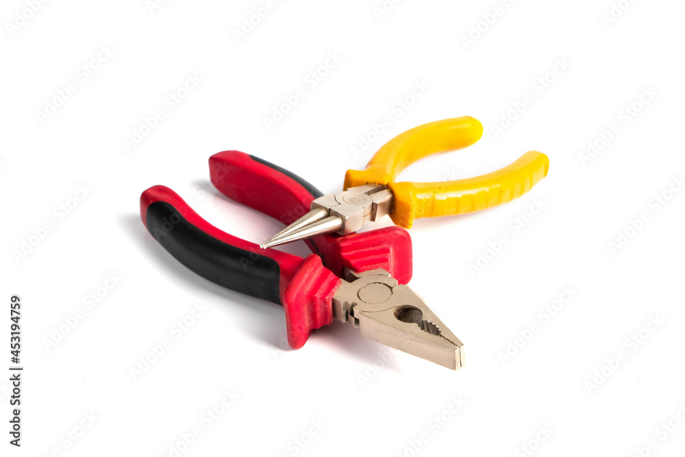 Set of pliers with insulating handles on white background. Tools for repair. Set of pliers with insulating handles on white background. Tools for repair.