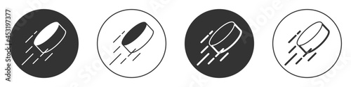 Black Hockey puck icon isolated on white background. Circle button. Vector