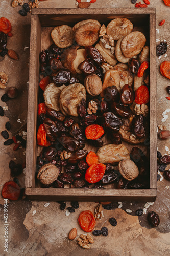 Healthy food dried fruits. prunes, dried apricots, raisins, figs, nuts. Top view. Copy space.