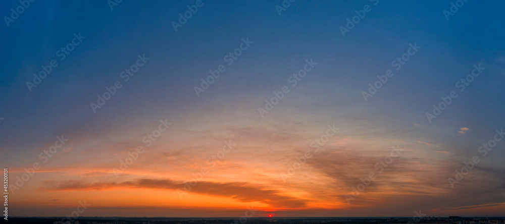 Dawn sky, sunbeams and dreams, morning panorama.