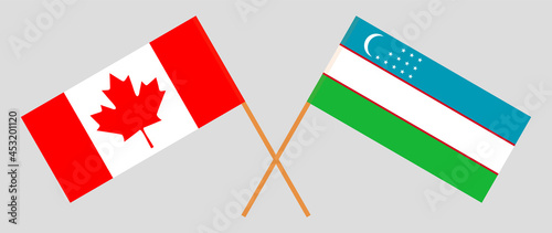 Crossed flags of Canada and Uzbekistan. Official colors. Correct proportion