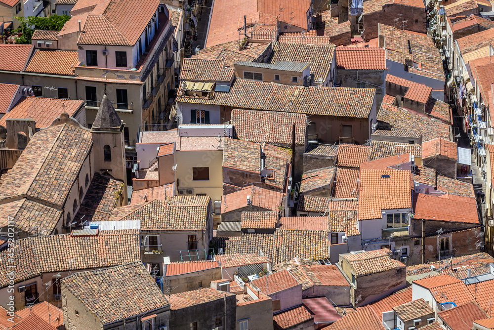 Roofs of buildings in historic part of Cefalu town on Sicily Island in Italy