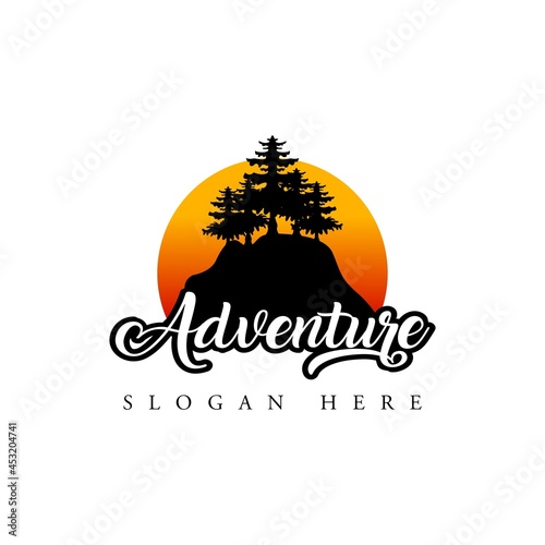 adventure logo. climbing logo on a hill of trees with sunset suasana photo