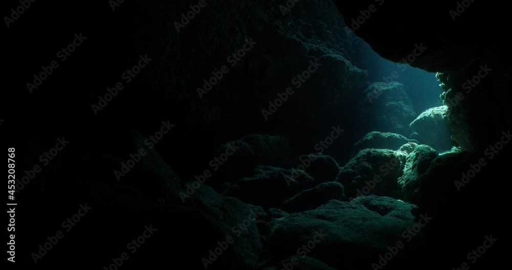 underwater caves and tunnels with nice lightning sun rays and sun beams relaxing ocean scenery backgrounds scuba divers to explore underwater caves and tunnels with nice lightning sun rays and sun beams relaxing ocean scenery backgrounds scuba divers to explore